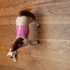 Barbies Horse, mechanic turn him on and he walks.